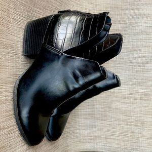 Black ankle booties. Hardly worn; scuffs no real damage. Closes on March 30, 22